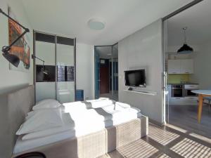 Turnau City Aparthotel客房内的一张或多张床位