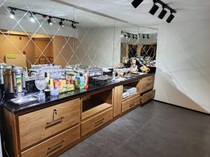 Kuchyň nebo kuchyňský kout v ubytování Fidanoglu Suite Hotel