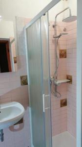 Koupelna v ubytování Izabela Apartment