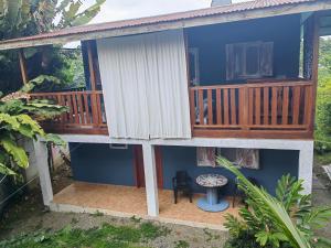 a view of a house with a balcony at Brisas del Caribe, casa 5 in Puerto Viejo
