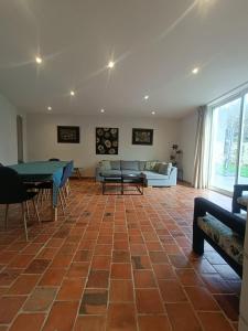 Posezení v ubytování Le Berceau de Carmen + 26 fotografií