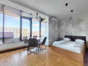 Turnau City Aparthotel客房内的一张或多张床位