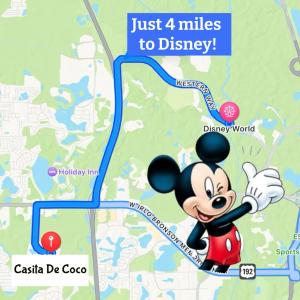 a map with mickey mouse and just miles to disney at Townhouse Near Disney Sleeps 10 Guests & Dog-Friendly! in Kissimmee