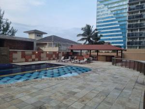 A piscina localizada em Flat Casa del Mar Barra da Tijuca ou nos arredores