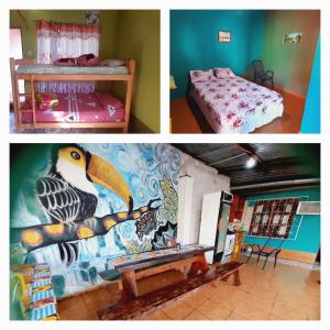 twee foto's van een kamer met een vogel op de muur geschilderd bij Hostel Loli in Puerto Iguazú