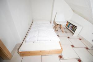 Postel nebo postele na pokoji v ubytování Cristallina II