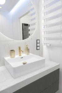 Koupelna v ubytování APARTAMENT WRAŻEŃ Kraków + 39 fotografií