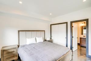 A bed or beds in a room at Custom Windham Mtn Villa with Pool, Theater and Views!
