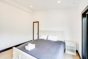 A bed or beds in a room at Custom Windham Mtn Villa with Pool, Theater and Views!