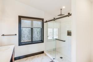A bathroom at Custom Windham Mtn Villa with Pool, Theater and Views!