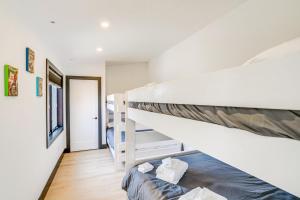 A bed or beds in a room at Custom Windham Mtn Villa with Pool, Theater and Views!