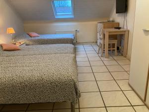 Postel nebo postele na pokoji v ubytování B&B Haus Jola
