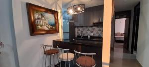 Kuchyň nebo kuchyňský kout v ubytování Espectacular apartamento de 3 habitaciones con piscina y parqueadero privado Excelente Relacion Precio Calidad Puntaje