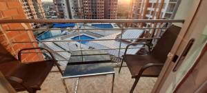 Bazén v ubytování Espectacular apartamento de 3 habitaciones con piscina y parqueadero privado Excelente Relacion Precio Calidad Puntaje nebo v jeho okolí