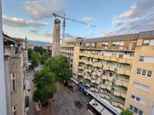 an overhead view of a city with a clock tower at Skopje 091 Macedonia st. in Skopje