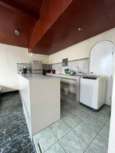 A cozinha ou cozinha compacta de Hotel Residencial Alfa