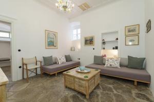 A seating area at LIVIN Hydra Garden Suite