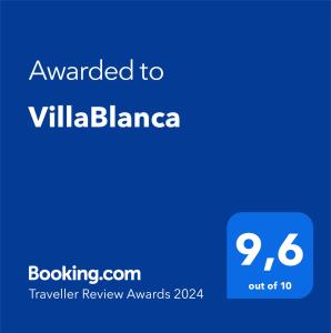 Et logo, certifikat, skilt eller en pris der bliver vist frem på VillaBlanca