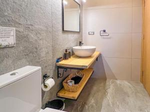 a bathroom with a sink and a toilet at PARLA KÜÇÜKKÖY in Ayvalık +35 photos