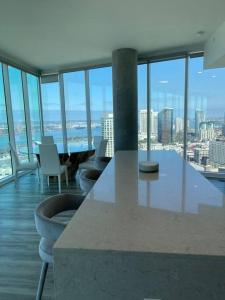 an office with a table and chairs and a view of the city at San Diego Convention Center Padres Ocean Views SD Zoo in San Diego