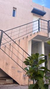 a set of stairs in front of a building at Tierras del Malbec 1 in Ciudad Lujan de Cuyo