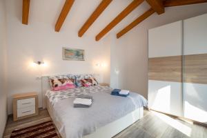 Postel nebo postele na pokoji v ubytování Holiday Home Fradelani