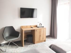 Telewizja i/lub zestaw kina domowego w obiekcie Hotel Beskidian