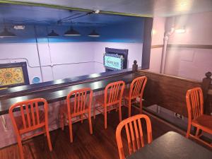 TV a/nebo společenská místnost v ubytování Gaslamp Hostel