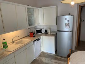 Η κουζίνα ή μικρή κουζίνα στο Apartment Nikos