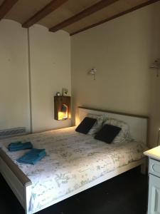 Postel nebo postele na pokoji v ubytování BelCiano (ancien Toit Vert)