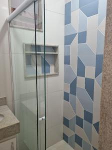 a shower with a glass door in a bathroom at COPACABANA RIO PRAIA 18 in Rio de Janeiro +35 photos