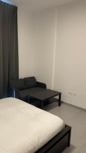 Postel nebo postele na pokoji v ubytování Al jada / Reef 4