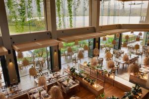 an overhead view of a restaurant with tables and chairs at 1 Hotel Hanalei Bay in Princeville