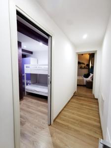 Postel nebo postele na pokoji v ubytování LA TORRETTA apartment suite