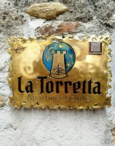 Certifikát, hodnocení, plakát nebo jiný dokument vystavený v ubytování LA TORRETTA apartment suite
