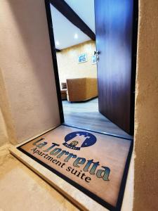 Certifikát, hodnocení, plakát nebo jiný dokument vystavený v ubytování LA TORRETTA apartment suite