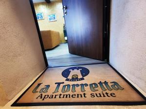 Certifikát, hodnocení, plakát nebo jiný dokument vystavený v ubytování LA TORRETTA apartment suite