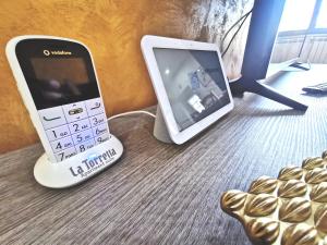 TV a/nebo společenská místnost v ubytování LA TORRETTA apartment suite