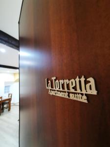 Certifikát, hodnocení, plakát nebo jiný dokument vystavený v ubytování LA TORRETTA apartment suite