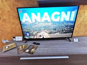 TV a/nebo společenská místnost v ubytování LA TORRETTA apartment suite