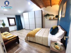Postel nebo postele na pokoji v ubytování LA TORRETTA apartment suite