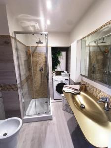 Koupelna v ubytování LA TORRETTA apartment suite