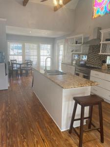 a kitchen with a large island in the middle at 311 Sunflower in Marble Falls