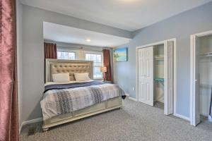 a bedroom with a bed and a window at Luxury Home in Linden