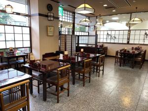 Restoran või mõni muu söögikoht majutusasutuses Hotel Alpha-One Miyoshi