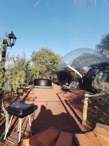 a glass dome sitting on top of a table at MEYAHUALLI GLAMPING in Huasca de Ocampo