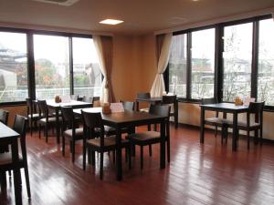 A restaurant or other place to eat at Okawa Riverside Hotel