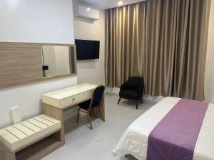 Hôtel Esma Nouadhibou客房内的一张或多张床位