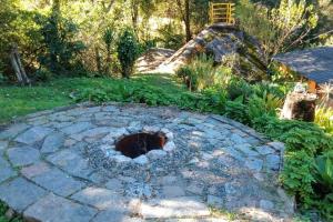 Um jardim em Casa ampla, 2 qtos, varanda, região de Extrema