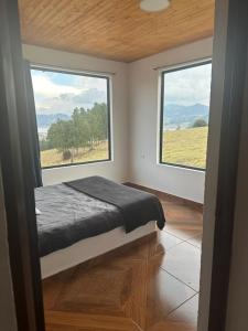 Postel nebo postele na pokoji v ubytování Finca Siberia, Sisga
